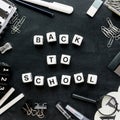 Black and white school supplies and words Ã¢â¬ÅBack to schoolÃ¢â¬Â Royalty Free Stock Photo